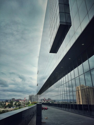 photo of gray glass building window