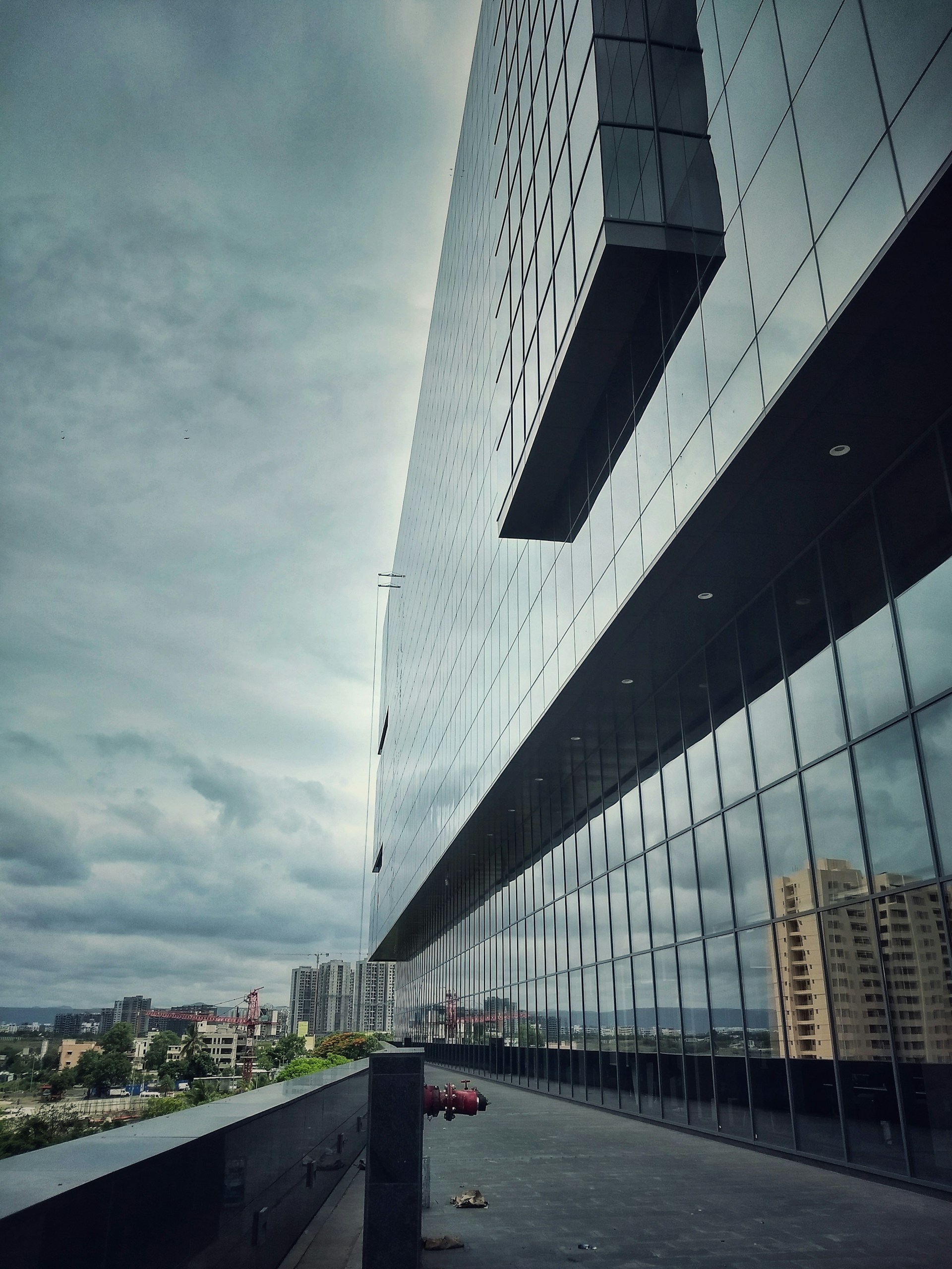 photo of gray glass building window