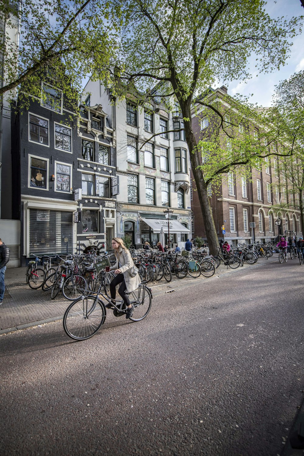 woman cycling on road