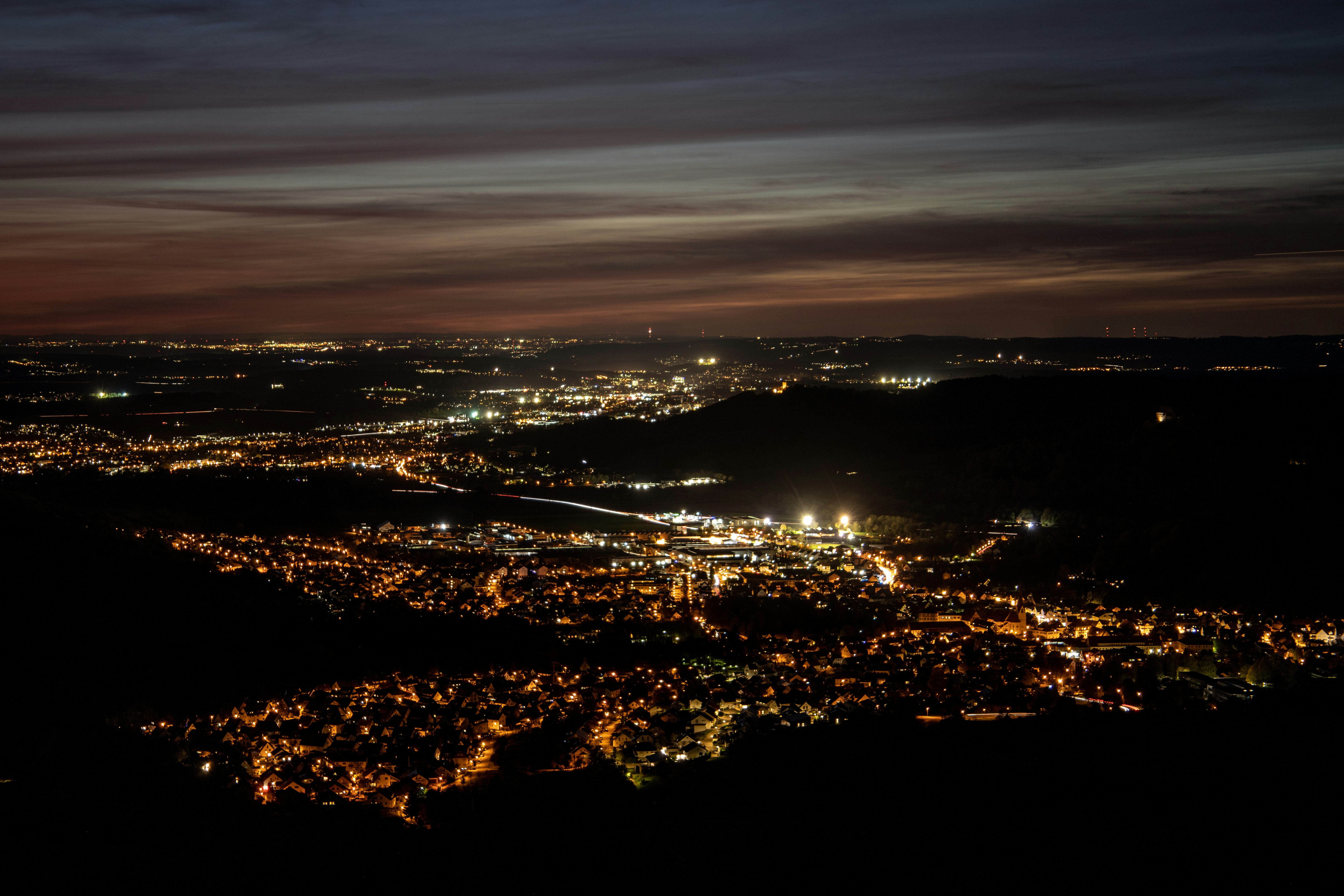 aerial view of lighted buildings during nighttime