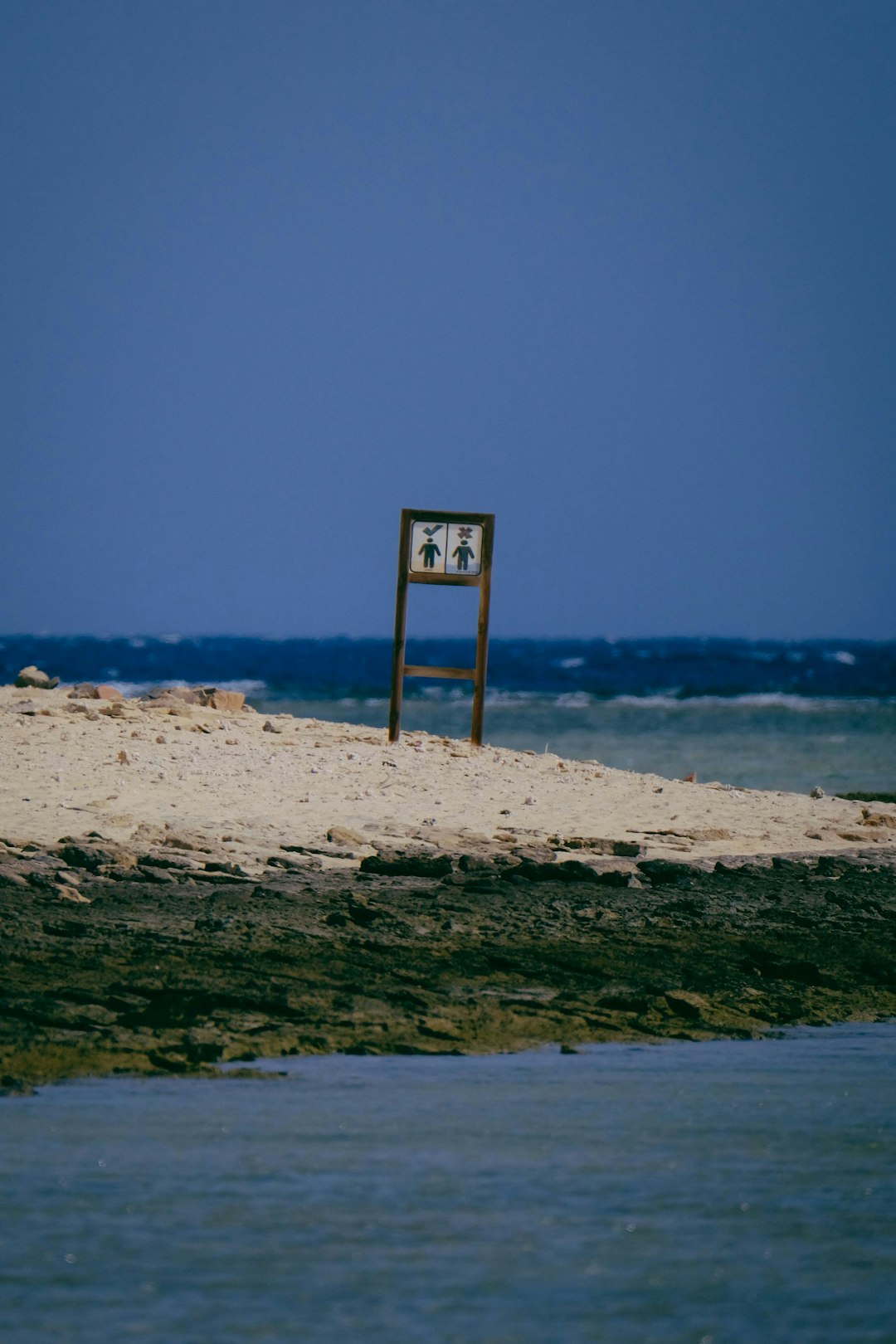 black signage near shore