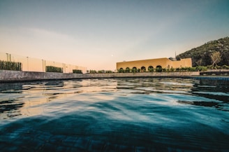 A serene view of the swimming pool at Kooyong Apartments.