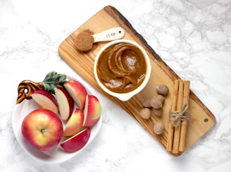 Apple, cinammon sticks, nutmegs