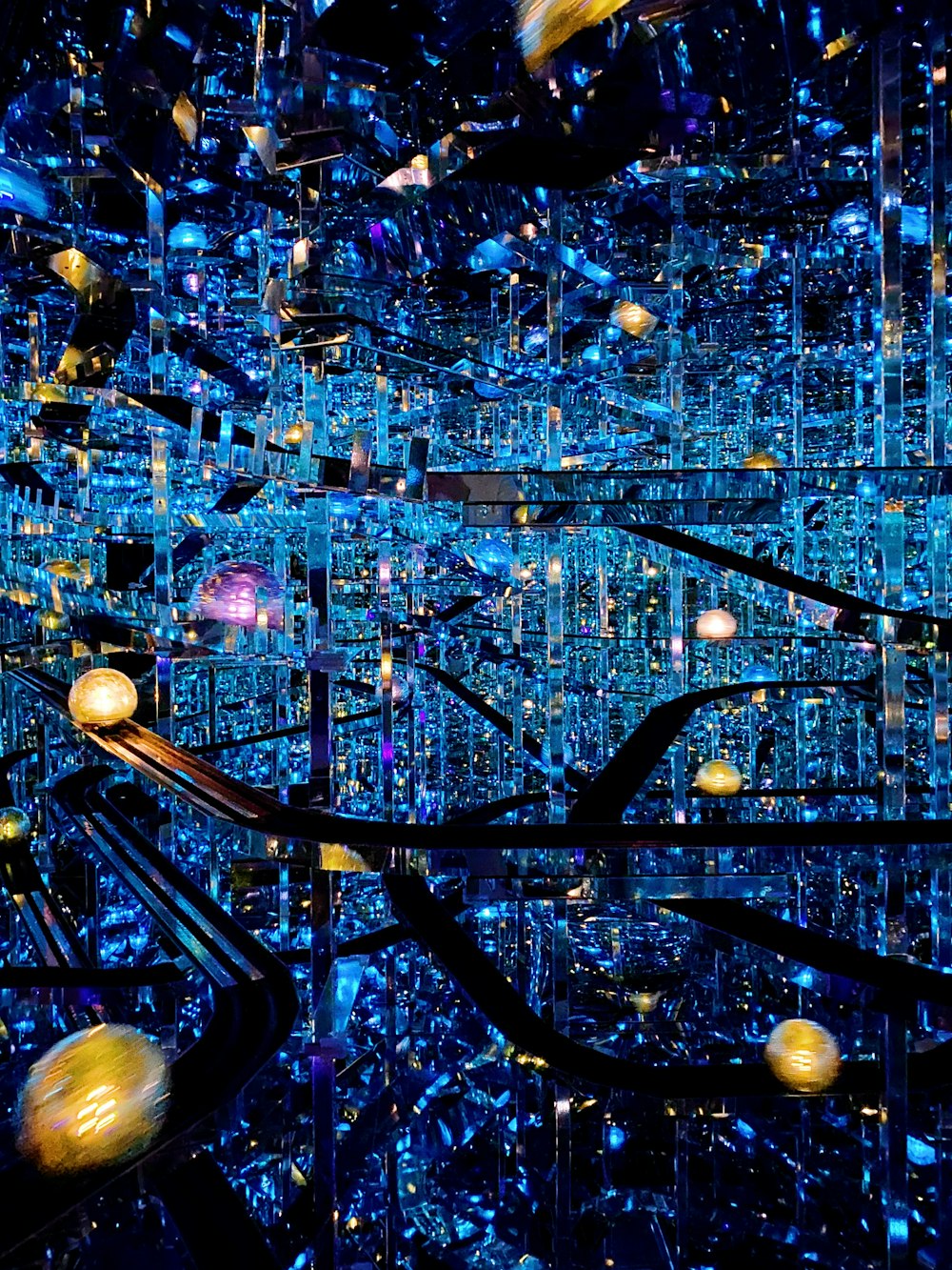a very large city filled with lots of blue lights