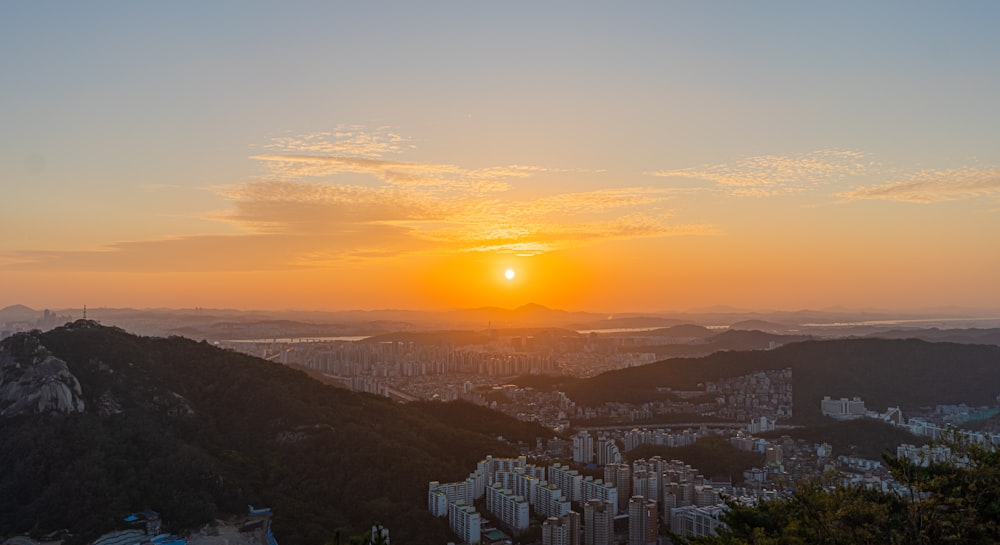 buildings near mountain during golden hour