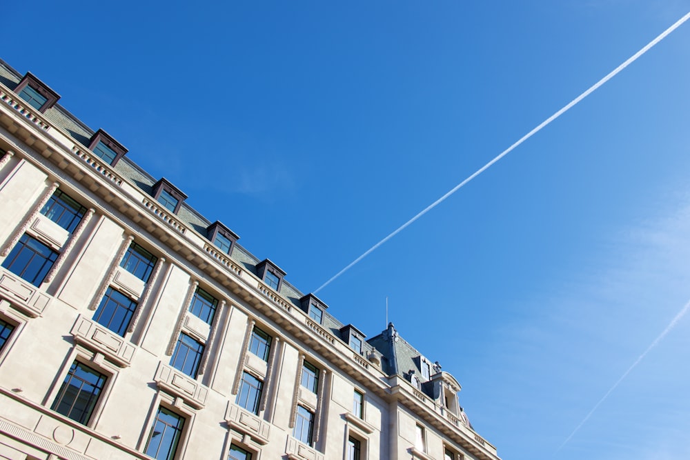 low angle photo of white building