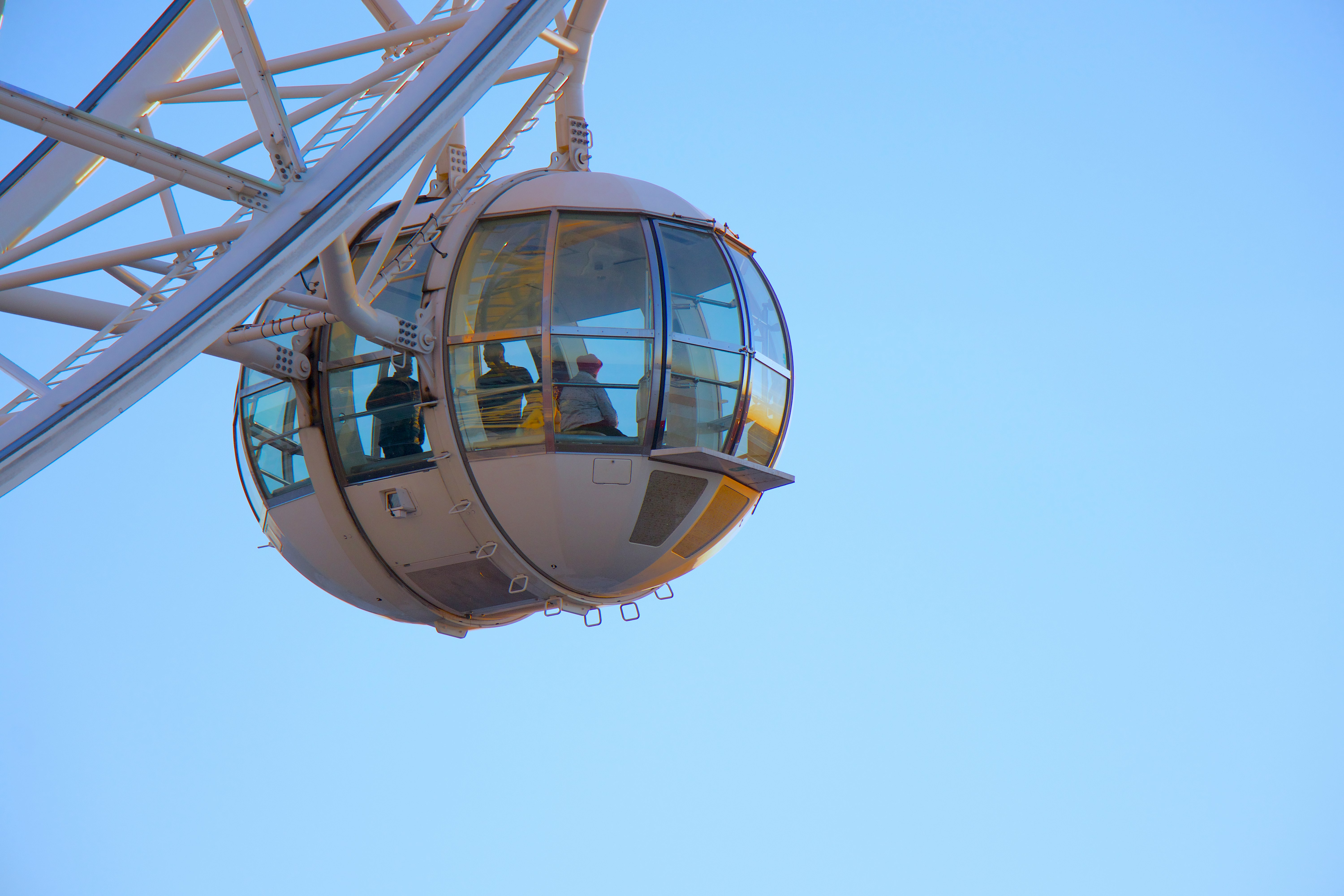 three people on Ferris wheel