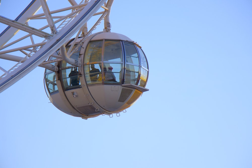 three people on Ferris wheel