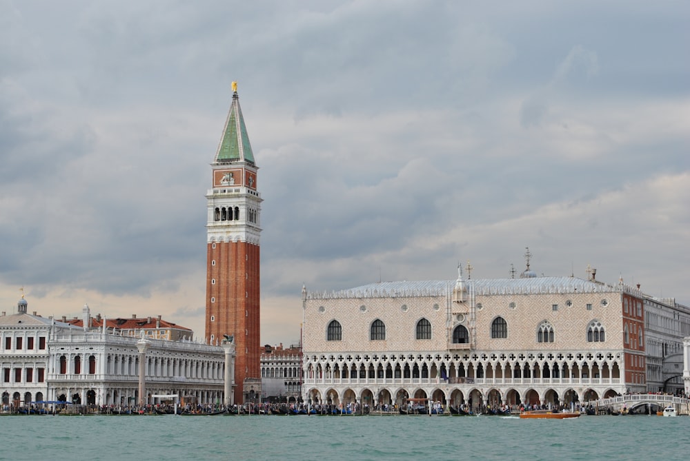 architectural photography of brown and white clock tower