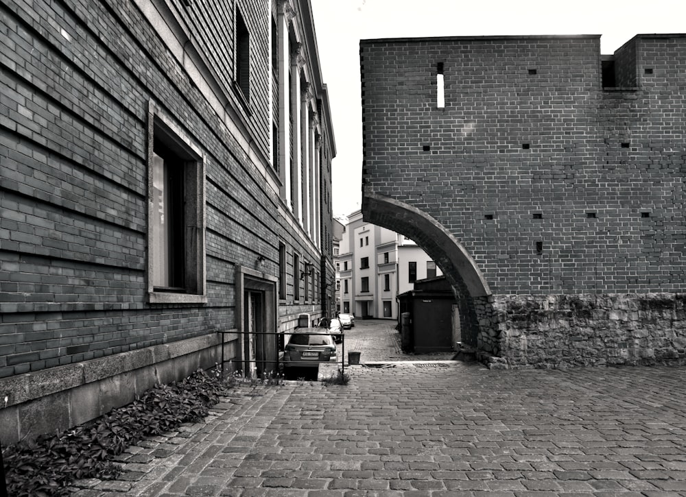 concrete building grayscale photo