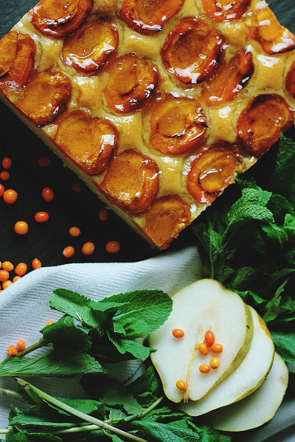 baked pastry and sliced fruit