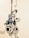 A decorative wall art featuring a stylized guitar with swirling patterns and abstract designs. Musical notes are included, adding to the creative and artistic theme.