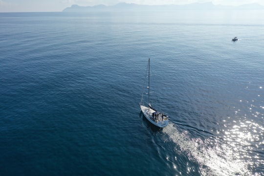 aerial photography of a white speedboat in the ocean in Mallorca Spain