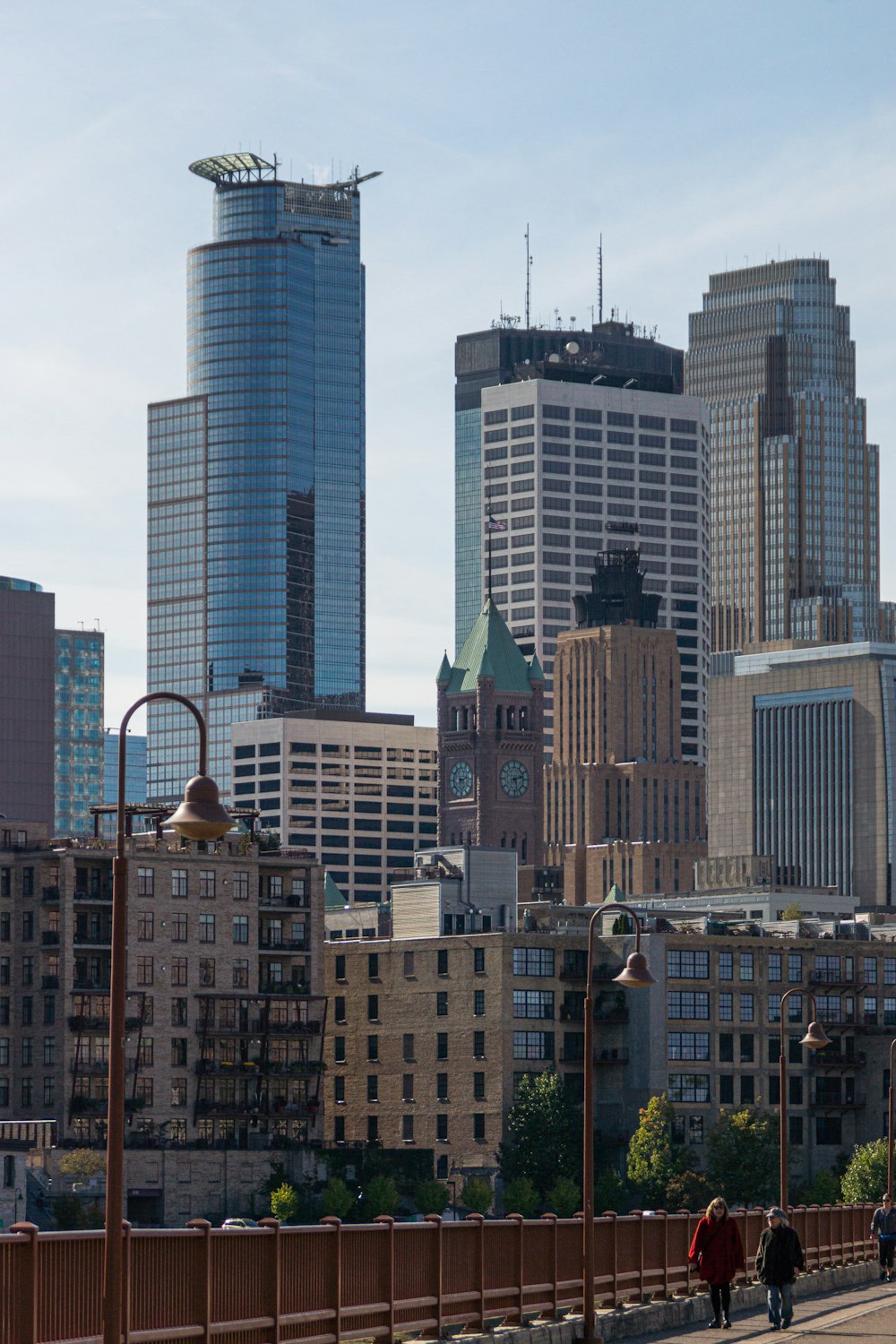 urban city buildings under a calm blue sky