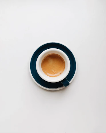 cup of coffee on top of saucer