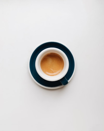 cup of coffee on top of saucer
