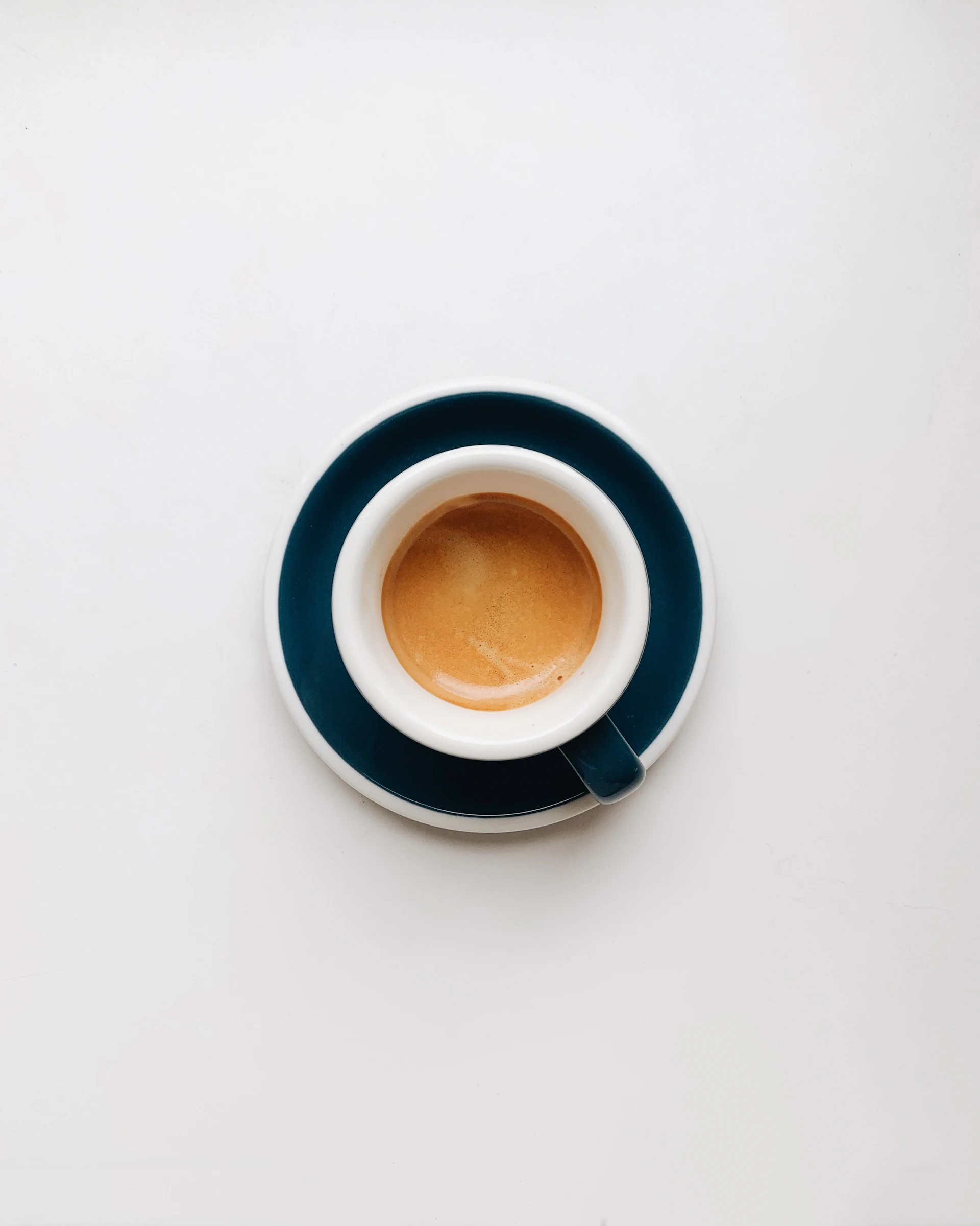 cup of coffee on top of saucer