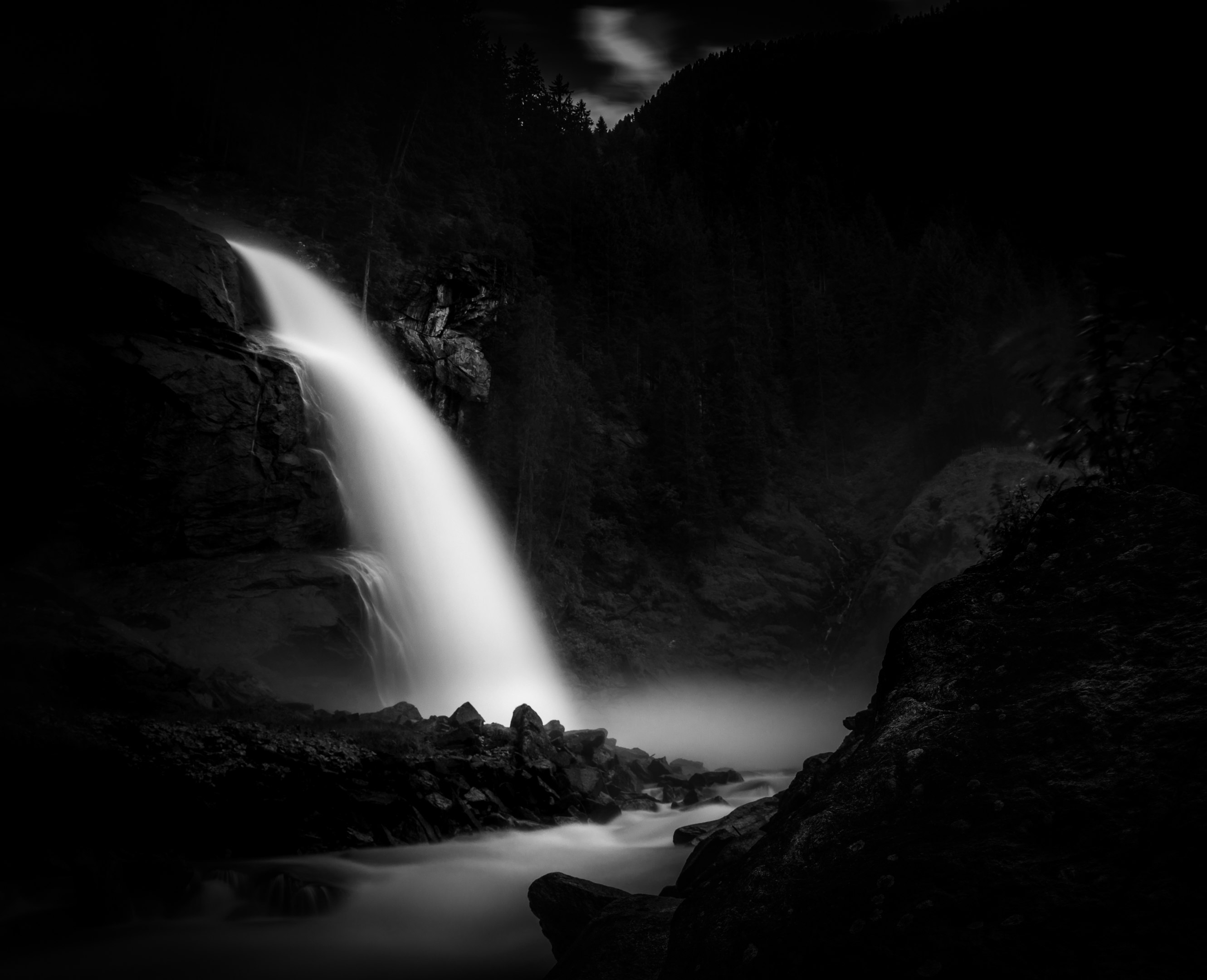 grayscale time lapse photography of flowing waterfall