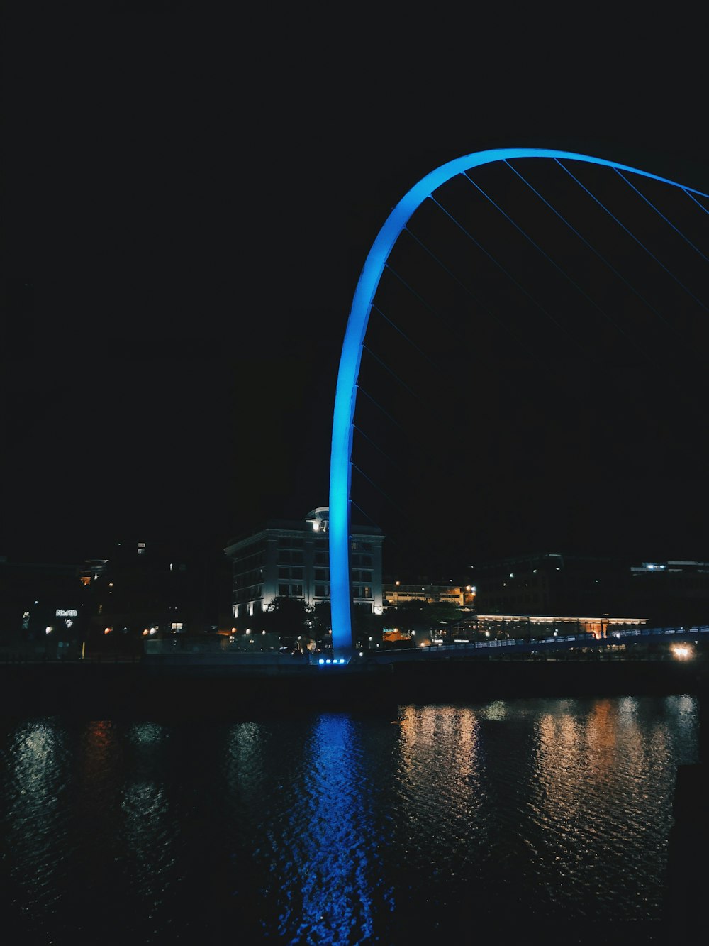 blue-lighted landmarj at night