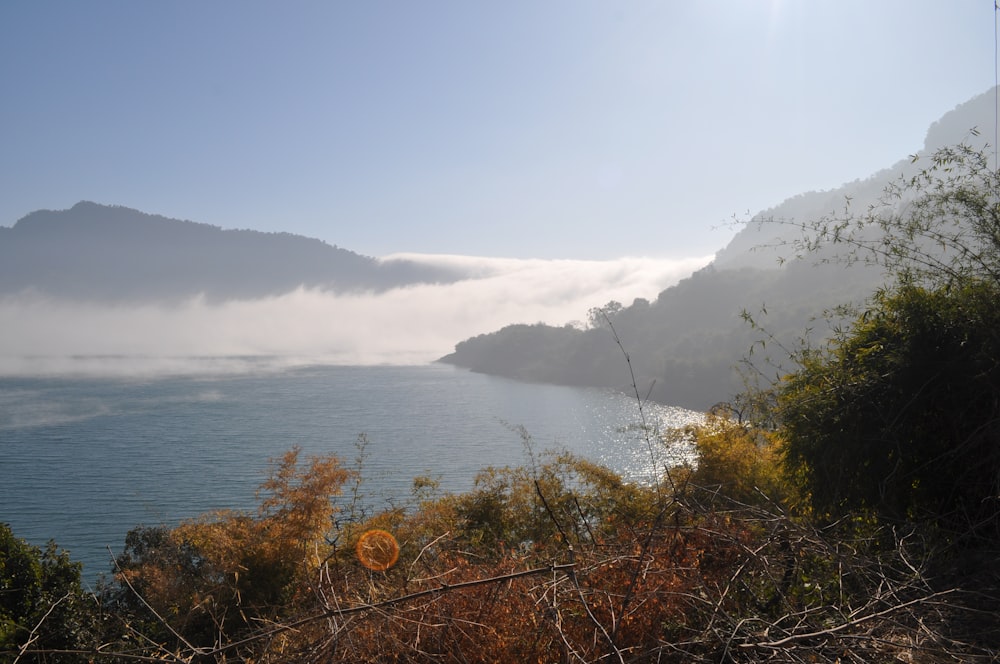 body of water near mountain ranges