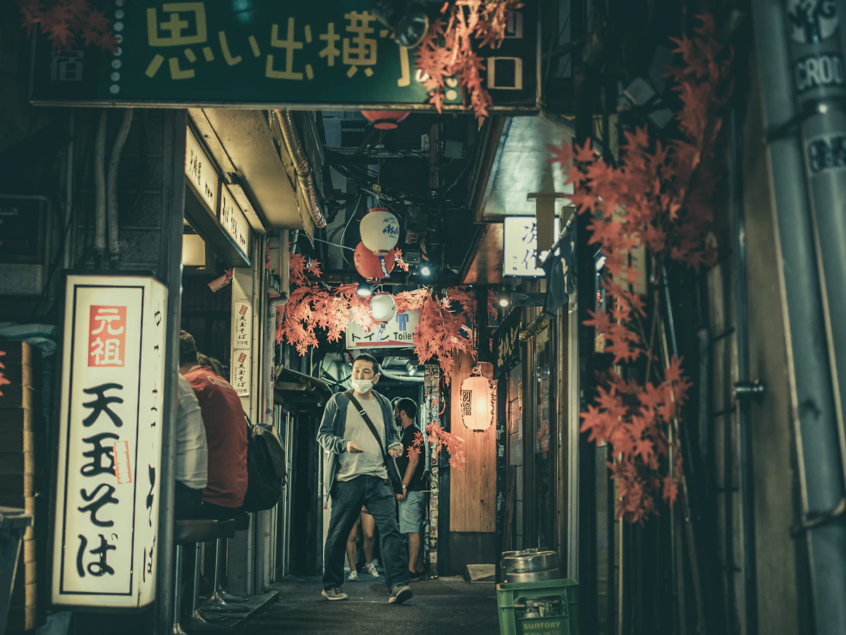 Lantern-lit izakaya alley in Tokyo at night