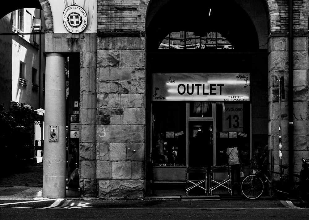 grayscale photography of a building front