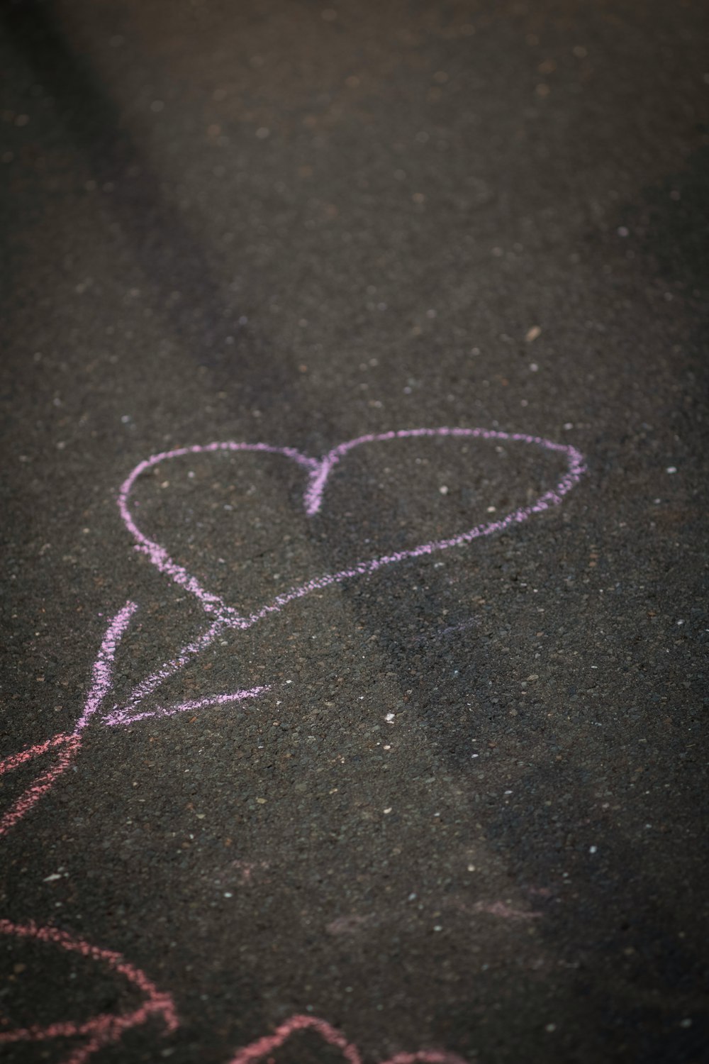 heart-shaped purple chalk drawing