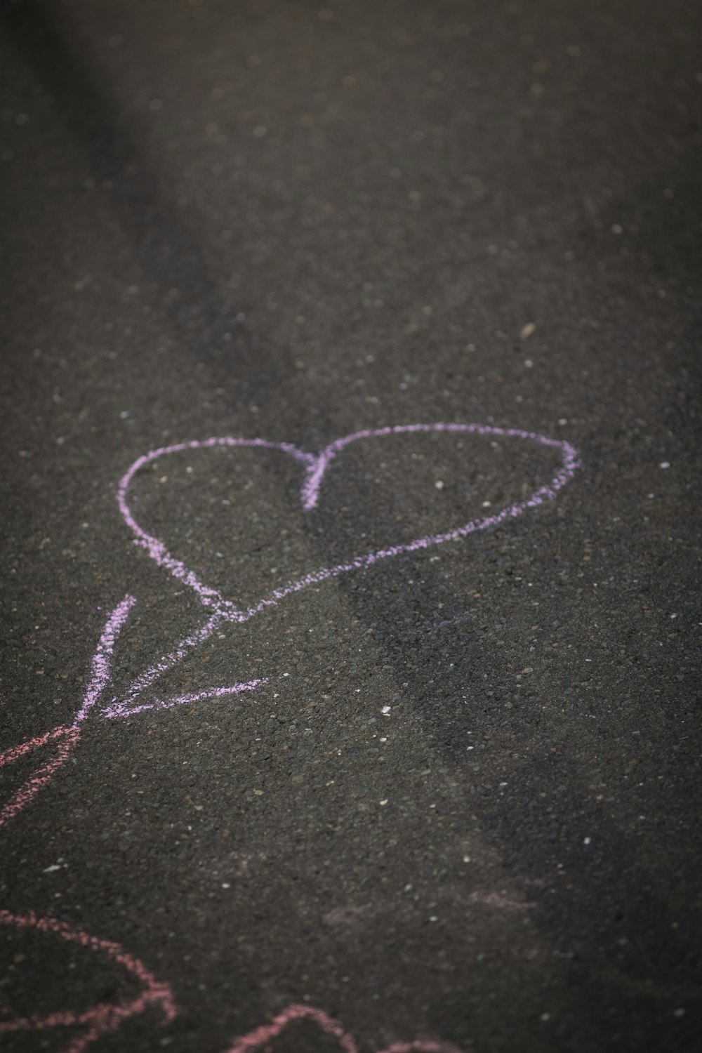 heart-shaped purple chalk drawing