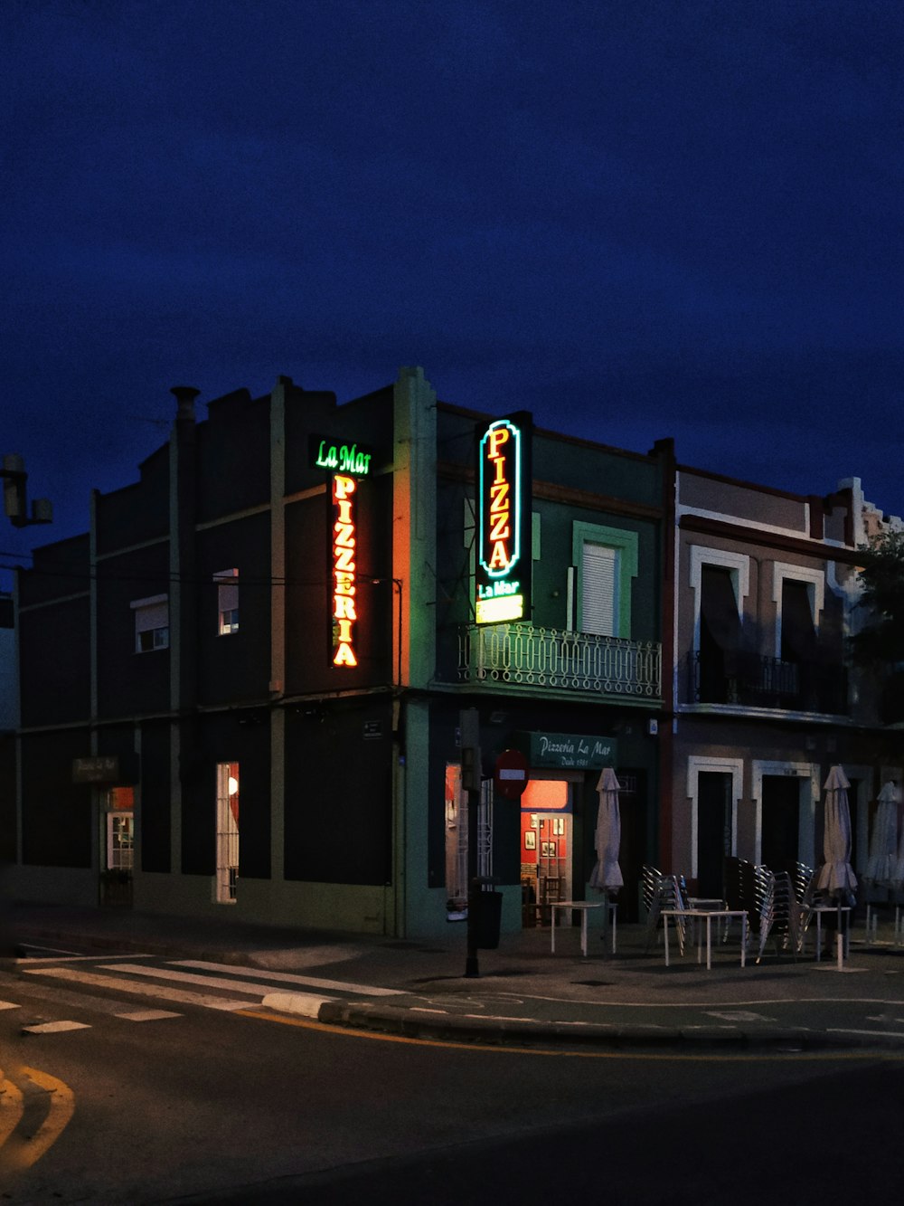 yellow and green pizza signage