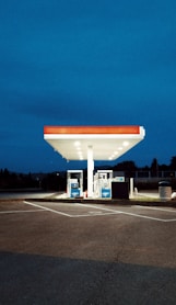 white and red gasoline station