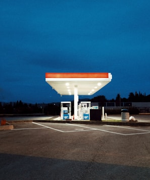 white and red gasoline station