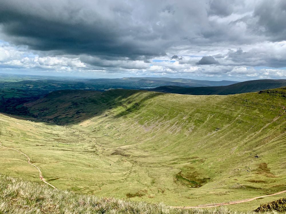 a view of a valley in the middle of a mountain range