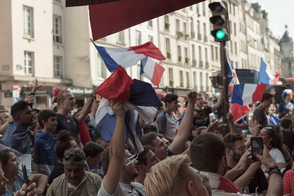 people holding flag of France