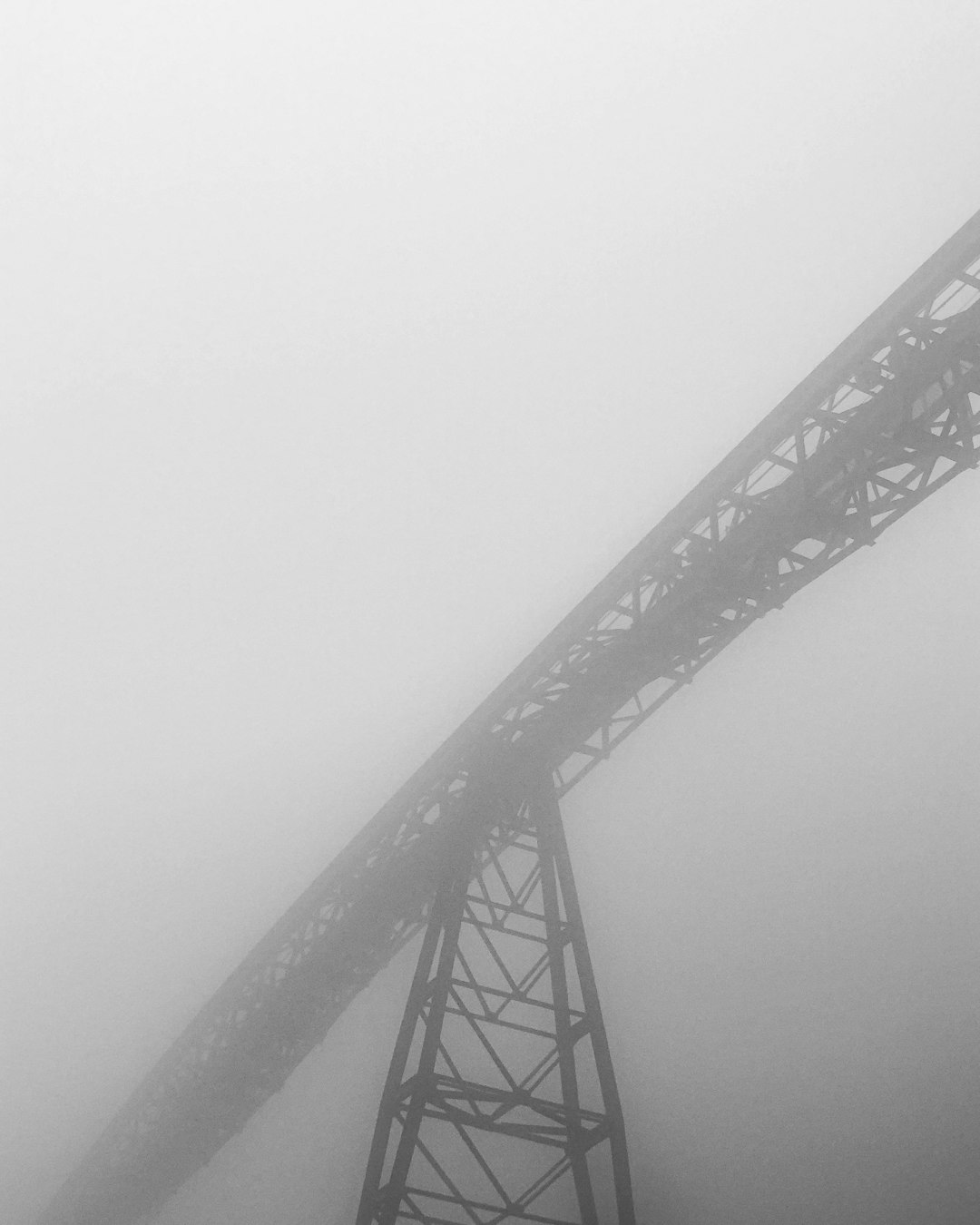 black metal trusse covered in white fog