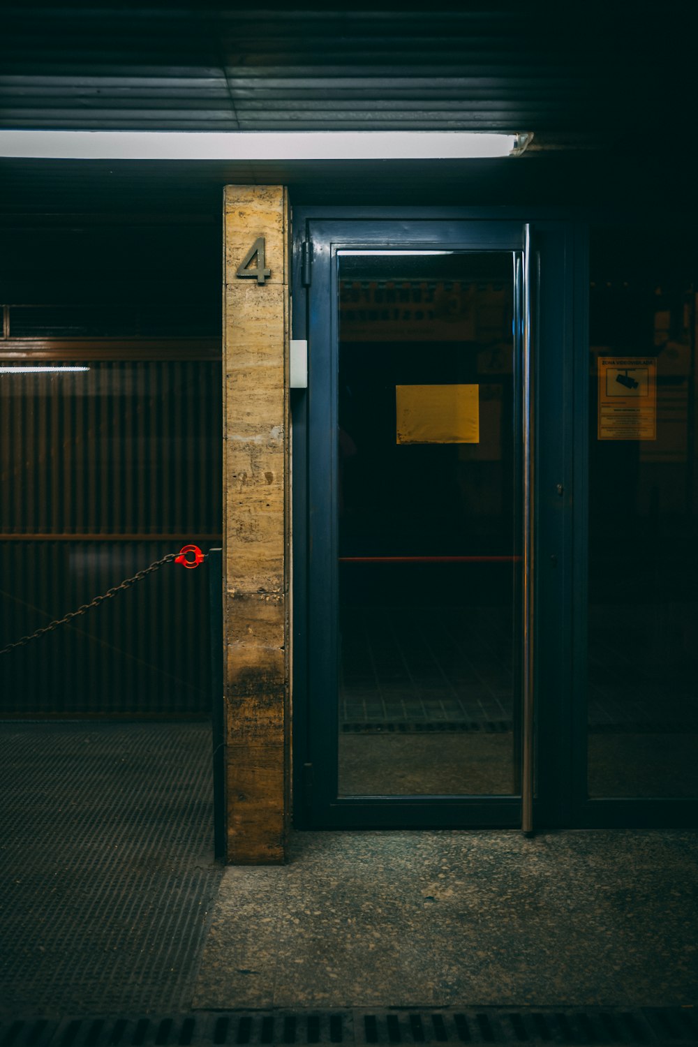 clear glass door with black frame