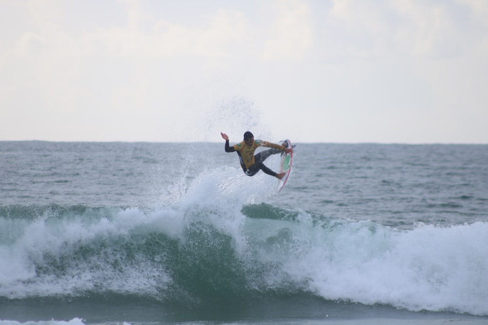 person riding surfboard