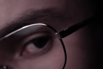 photo of person wearing eyeglasses