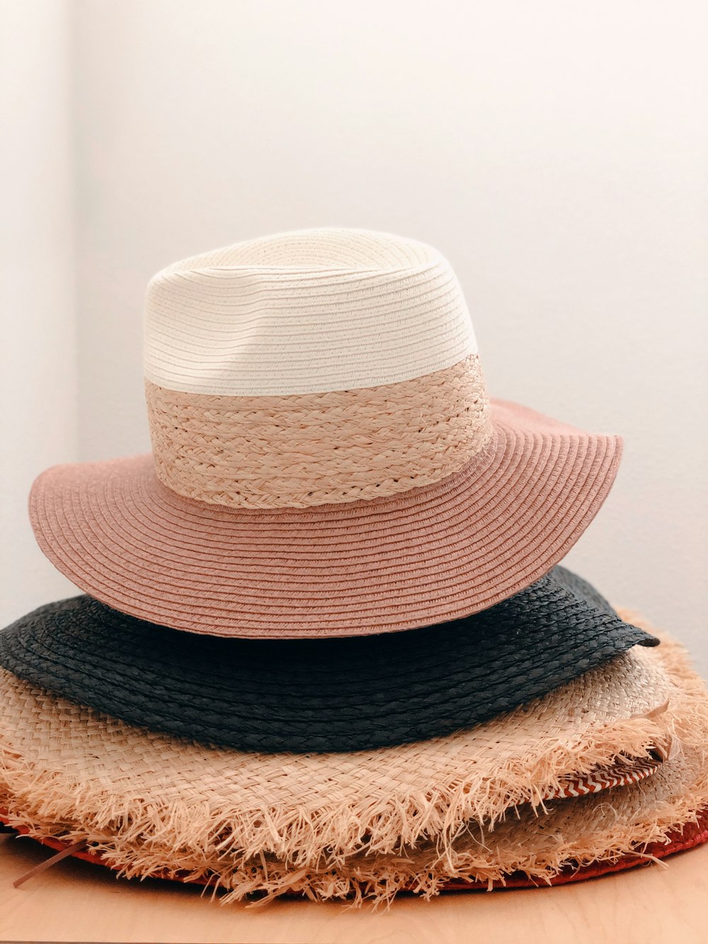 shallow focus photo of gray and brown hat