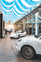 High-performance epoxy floor in an automotive shop, showing glossy finish and clean lines.