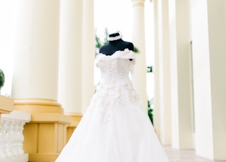white off-shoulder wedding dress