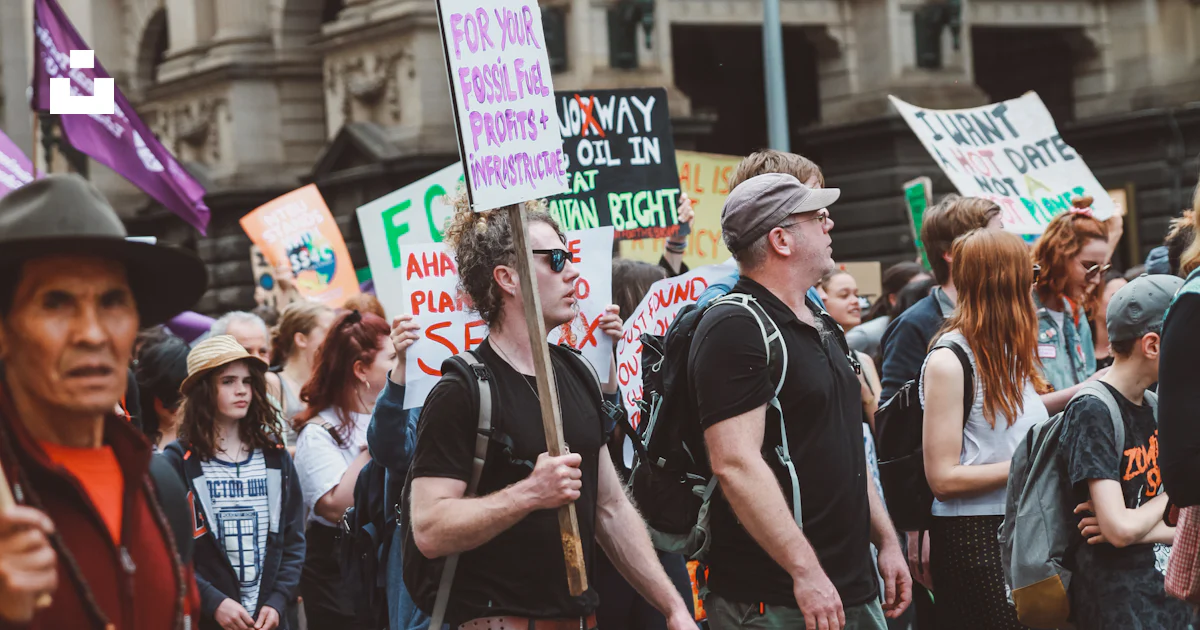 People rallying on road photo – Free Human Image on Unsplash