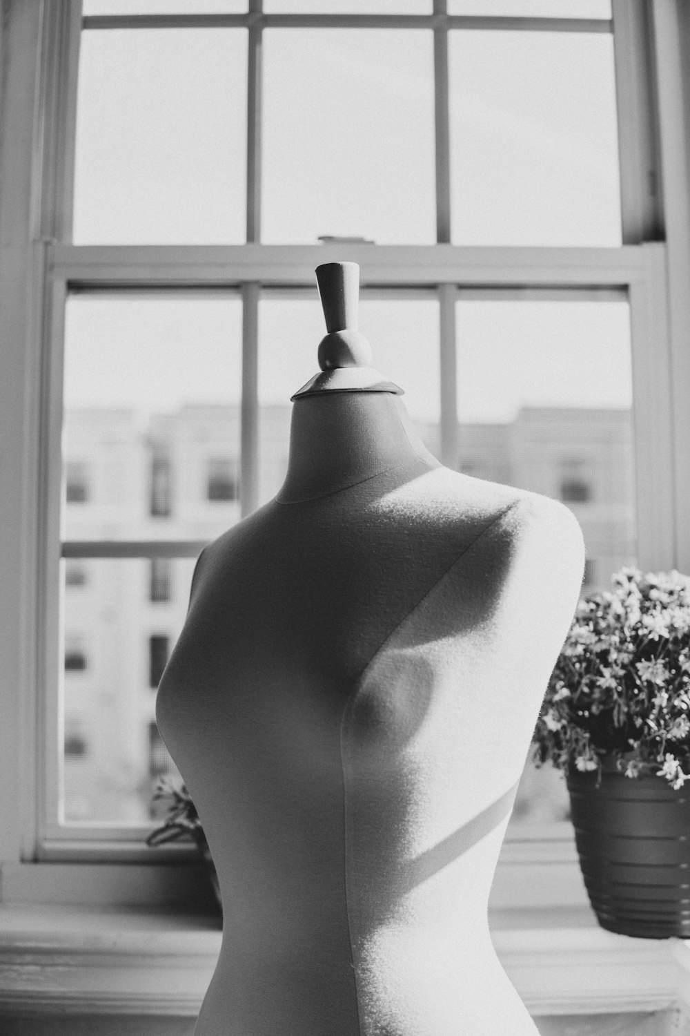 grayscale photo of wedding gown
