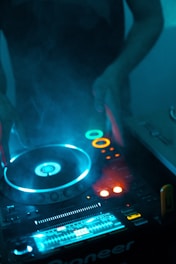 person using DJ turntable