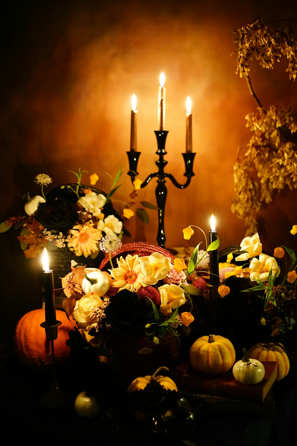 white flowers with lighted candles