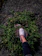 A happy customer walking outdoors wearing eco-friendly shoes from luthfi shoes k-lin.