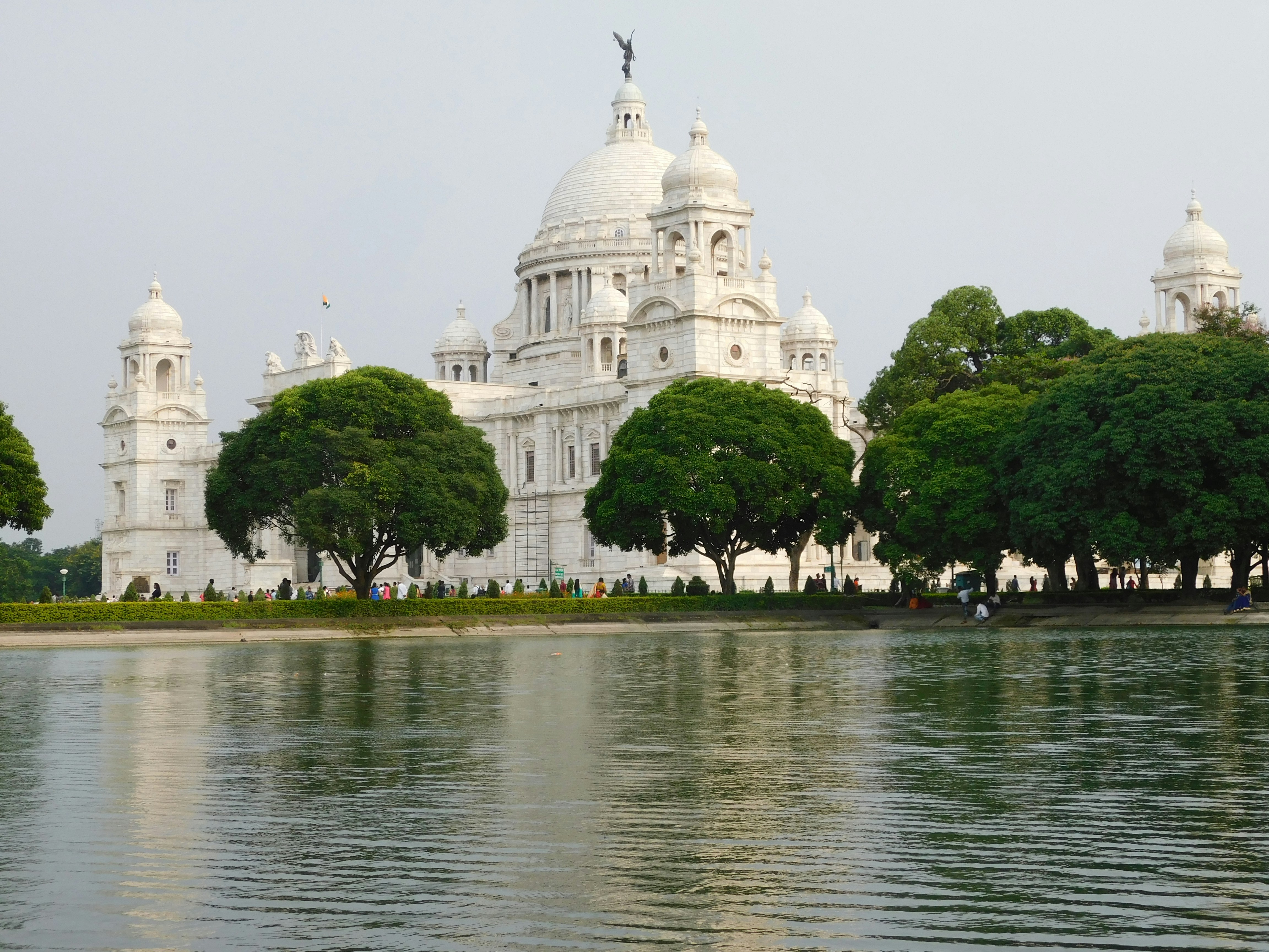 white dome building near lake