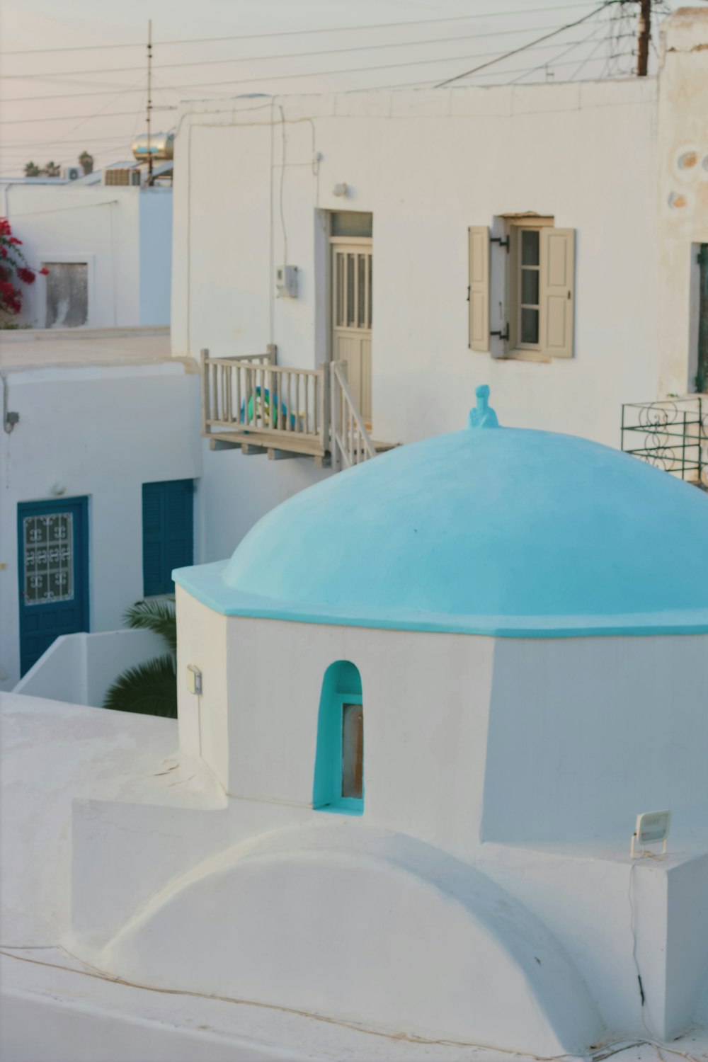 architectural photography of white and teal concrete house