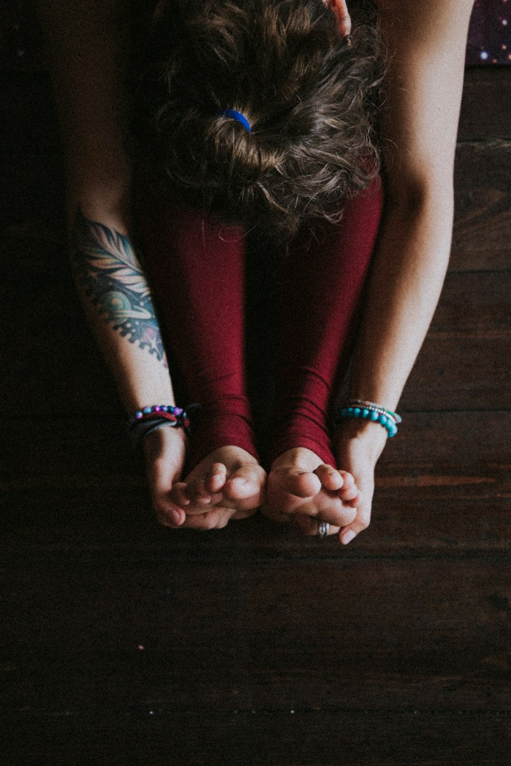 unknown person stretching indoors