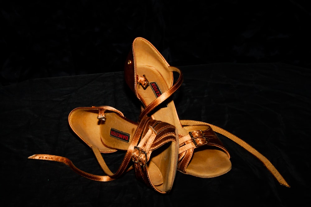pair of brown heeled sandals