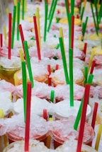 A colorful assortment of ice treats and fresh fruit drinks.